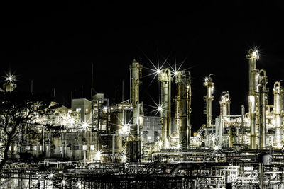 Illuminated buildings in city at night