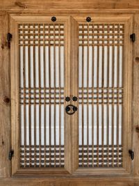 Closed wooden door of building