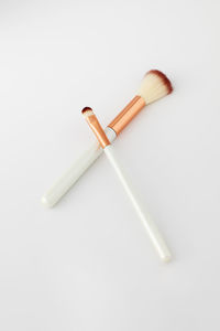 High angle view of chopsticks on white background