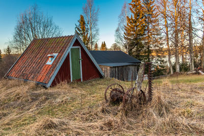 House on field against sky