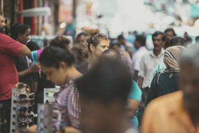 Group of people looking at city street