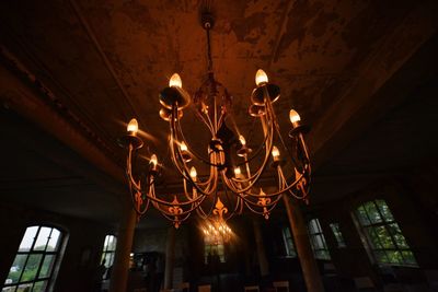 Low angle view of illuminated chandelier