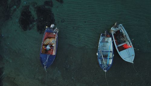 High angle view of boat moored in lake