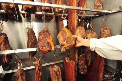 Man preparing food at market stall