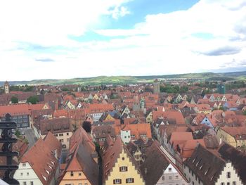 Aerial view of town against sky