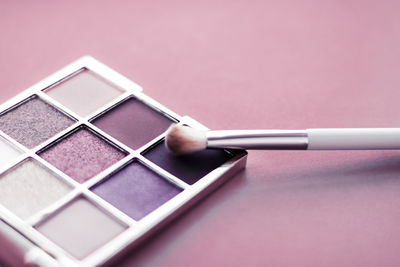 Close-up of beauty products on table