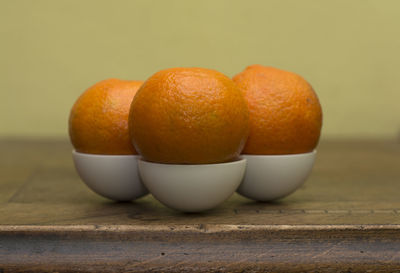 Close-up of orange fruit on table