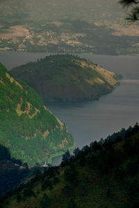 High angle view of landscape and sea