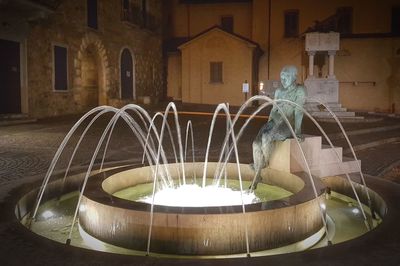 Fountain in front of building