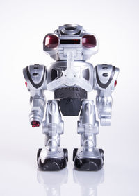 Close-up of robot against white background