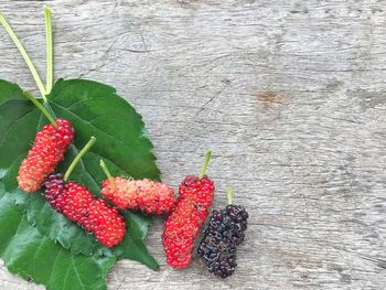 High angle view of strawberries on table