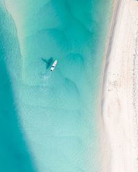 Aerial view of person sailing in sea