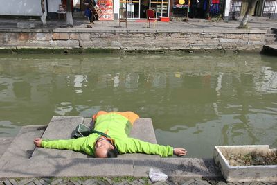 Woman sitting in water