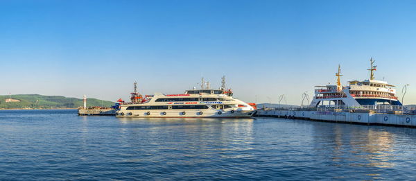 View of ship in sea against clear sky