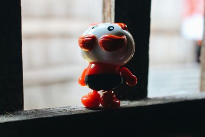 Close-up of red toy on table