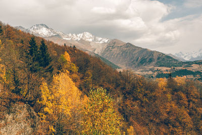Scenic view of mountains against sky during autumn