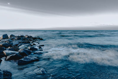 Scenic view of sea against clear sky