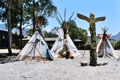 Tent on field against sky