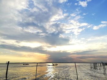 Scenic view of sea against sky at sunset