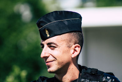 Portrait of young man looking away