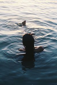 Man swimming in lake