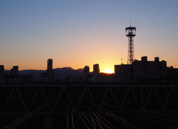 Silhouette of tower at sunset