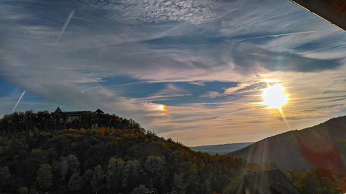 Scenic view of mountains against sky during sunset