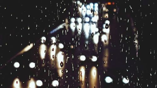 Close-up of wet window in rainy season