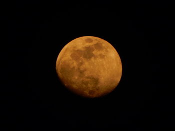 Scenic view of moon against sky at night