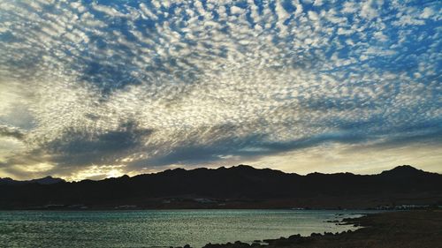 Scenic shot of calm sea at sunset