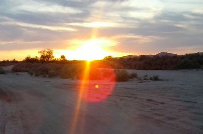 Scenic view of sunset over landscape