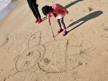 Full length of woman on beach