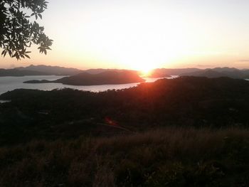 Scenic view of mountains at sunset