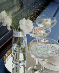 A beautiful composition of dishes and fresh flowers in the water