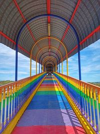 Symmetry of colourful bridge connecting two village