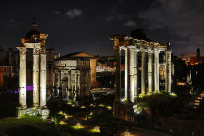 Nocturnal view of the archaeological area of the imperial forums of rome, travel reportage