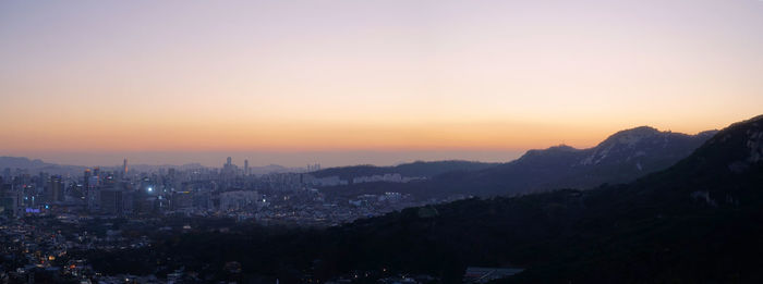 View of cityscape at sunset