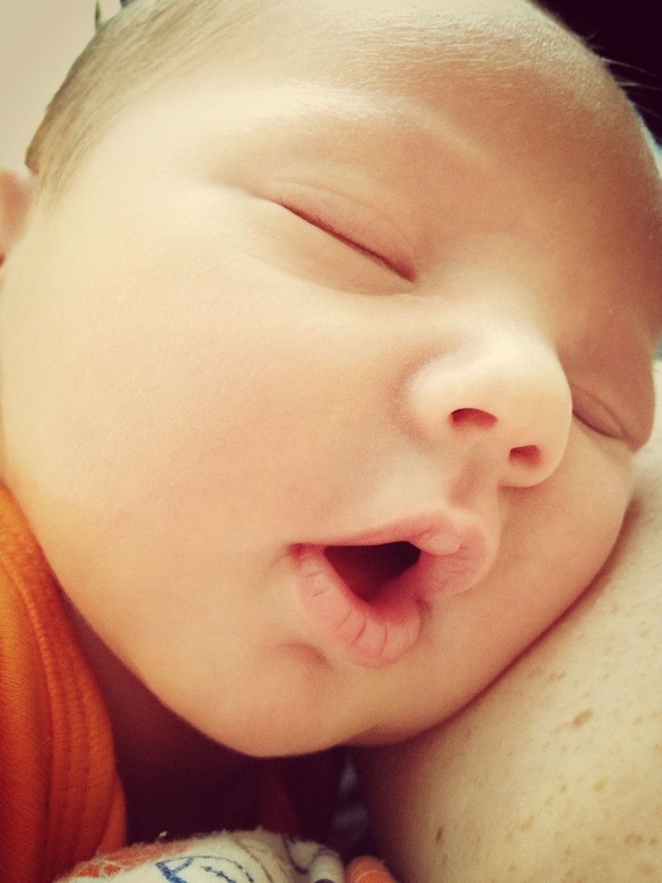 indoors, baby, childhood, close-up, babyhood, innocence, lifestyles, bed, unknown gender, toddler, cute, newborn, relaxation, person, headshot, part of, sleeping