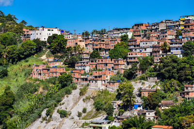 Photograph of low-income peripheral community popularly known as favela in rio de janeiro, brazil