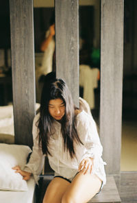 Woman sitting outdoors