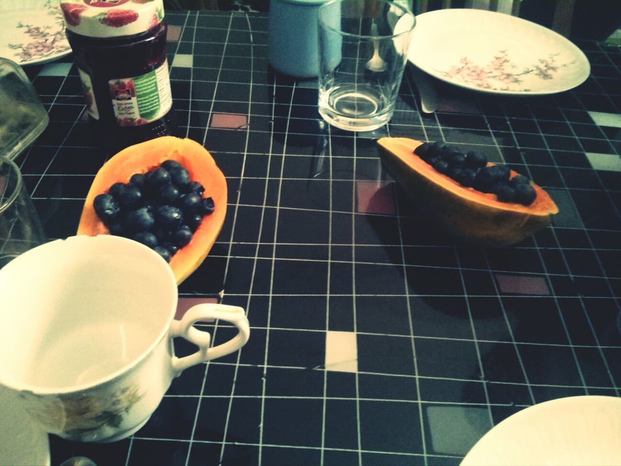 food and drink, indoors, drink, coffee cup, coffee - drink, high angle view, freshness, table, refreshment, food, still life, spoon, saucer, cup, plate, directly above, coffee, breakfast, healthy eating, preparation