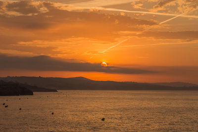 Scenic view of sunset over sea