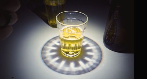 Close-up of beer glass on table
