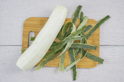 High angle view of vegetables on cutting board