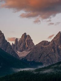 Scenic view of mountains against sky during sunset