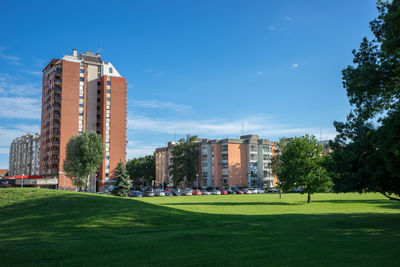 Buildings in city against sky