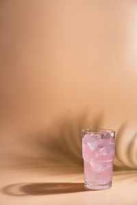 Close-up of drink against white background