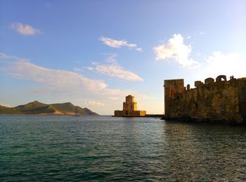 The bourtzi tower of medieval fortress in methoni on sunset time, peloponnese