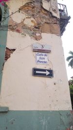 Low angle view of information sign