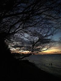 Scenic view of sea against sky at sunset